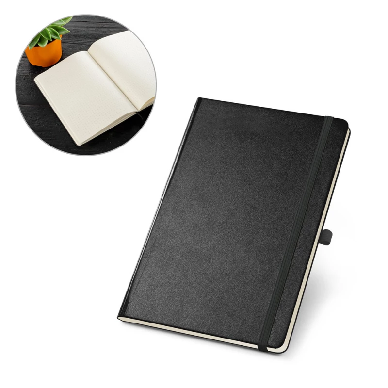 caderno com folhas pontilhadas 
